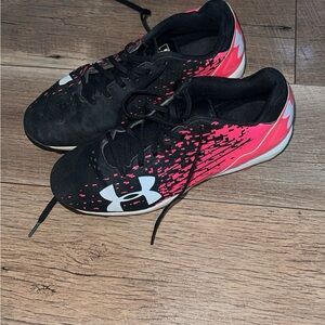 Girls softball cleats under Armour brand